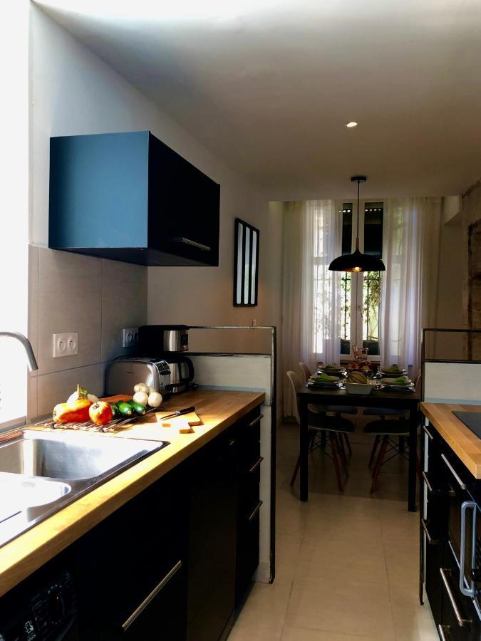 Le 26 Apartment Nimes Bagian luar foto