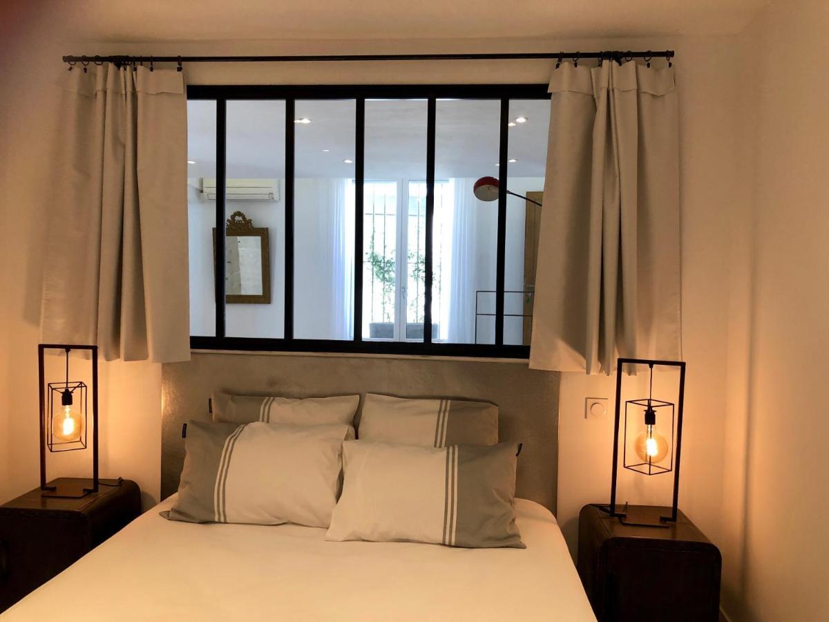 Le 26 Apartment Nimes Bagian luar foto